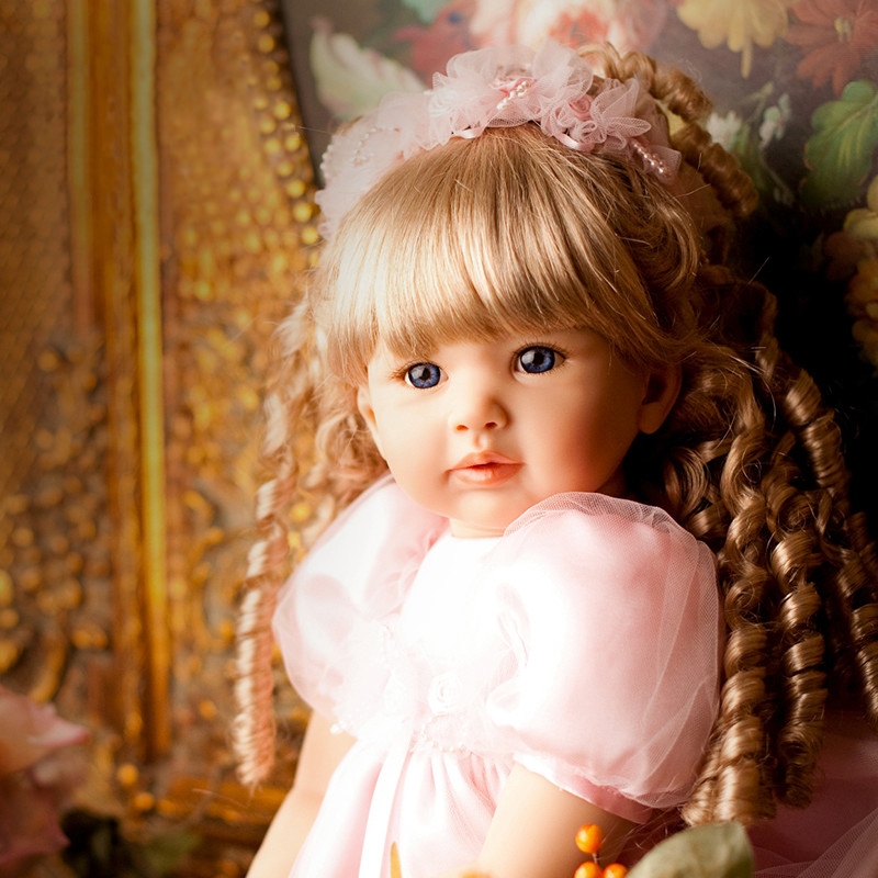 NPK 60CM Handmade Soft Silicone Reborn Toddler Lifelike Baby Girl Doll Curly Blonde Hair Princess Doll with Pink Skirt